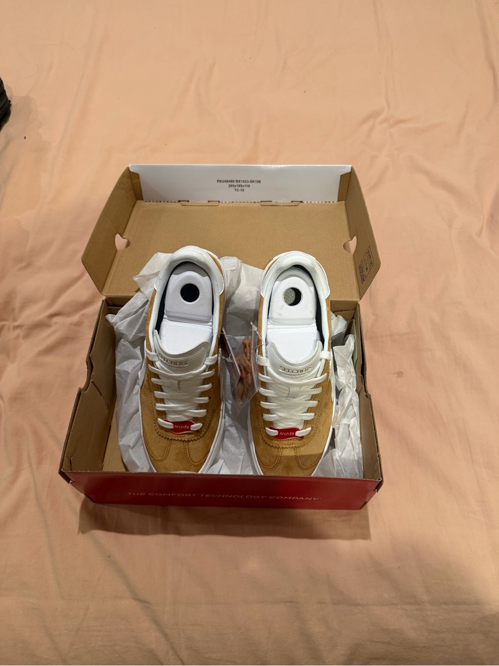 Skechers Women's Gold and White Sneakers. New in box. Never been worn